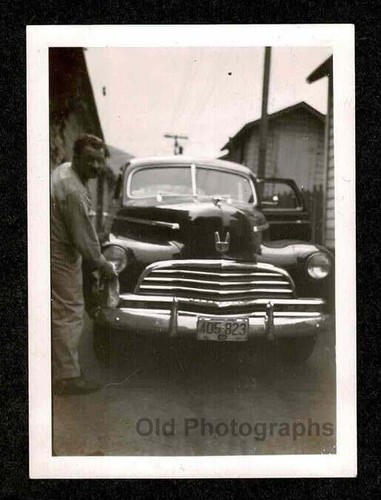 Man polishing car - chrome, split
